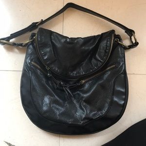 Black leather handbag with cute zipper accents